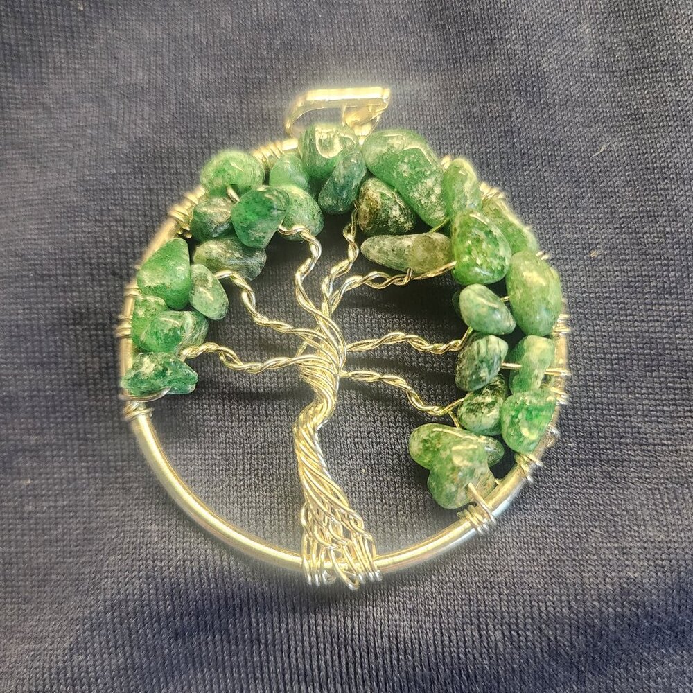 Jade and silver tone wire 1.5 inch dia. Tree of Life pendant